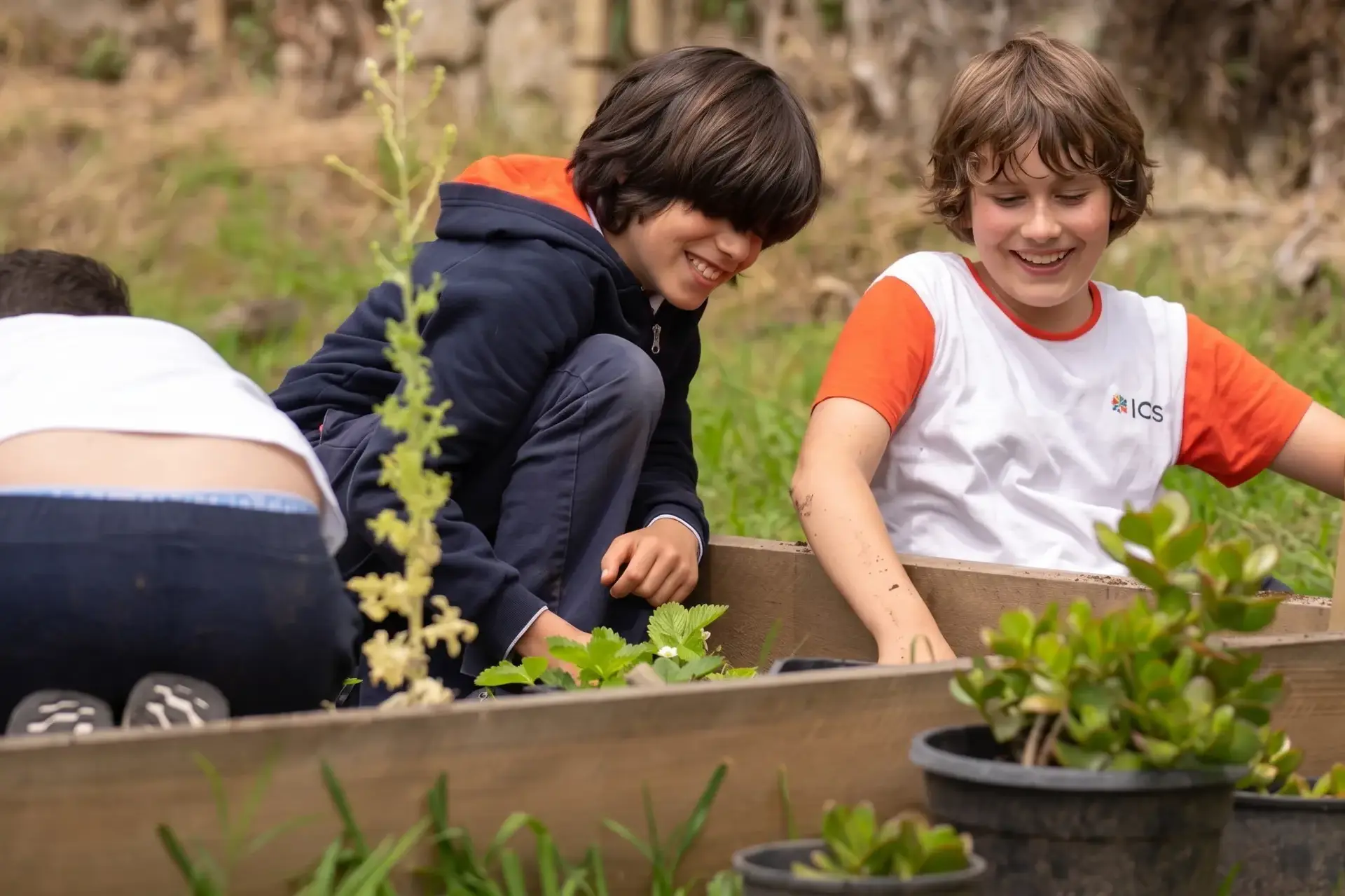 RIS students gardening.
