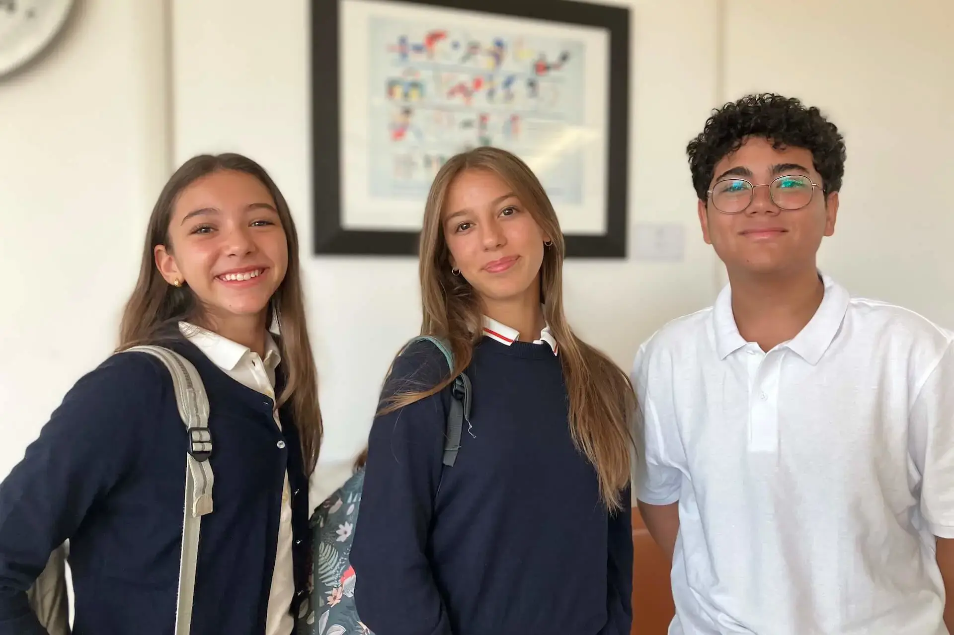 Middle School students smiling on the first day of the school year.