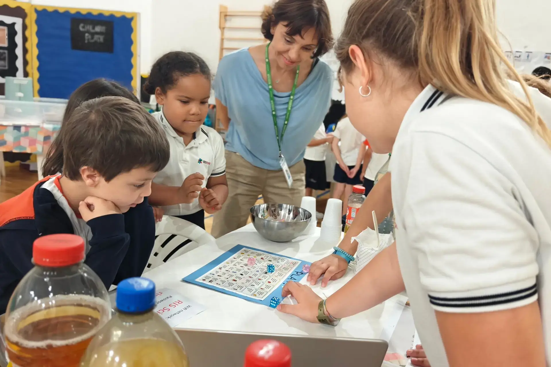 students working together on a science experiment in class