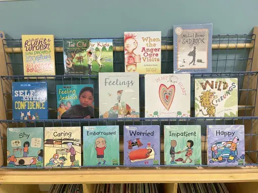 classroom bookshelf display of children's books about emotions and social-emotional learning.