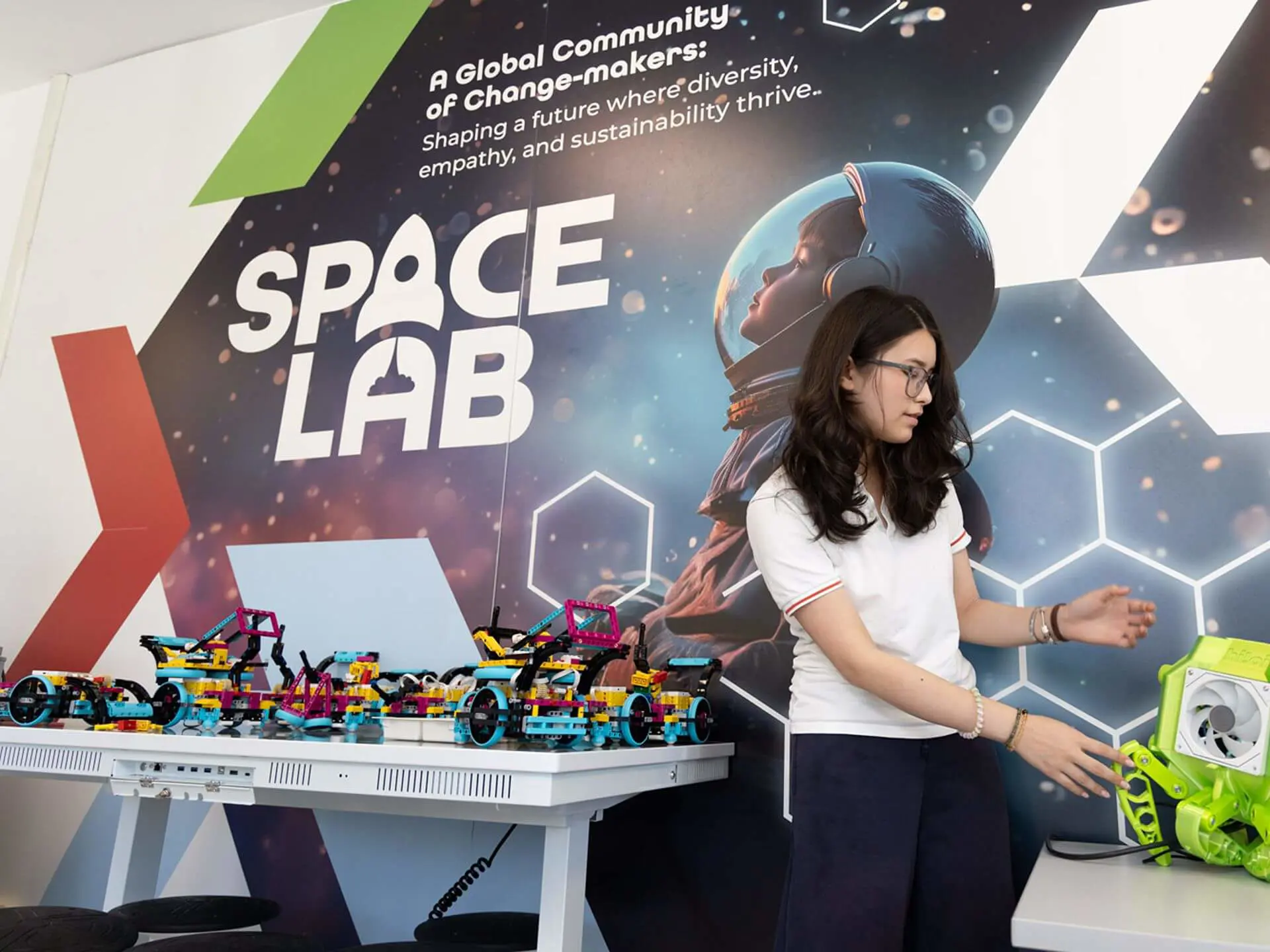 RIS student with robotics project in the Space Lab
